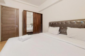 Comfy and Furnished 1BR with Extra Room Sky House BSD Apartment By Travelio